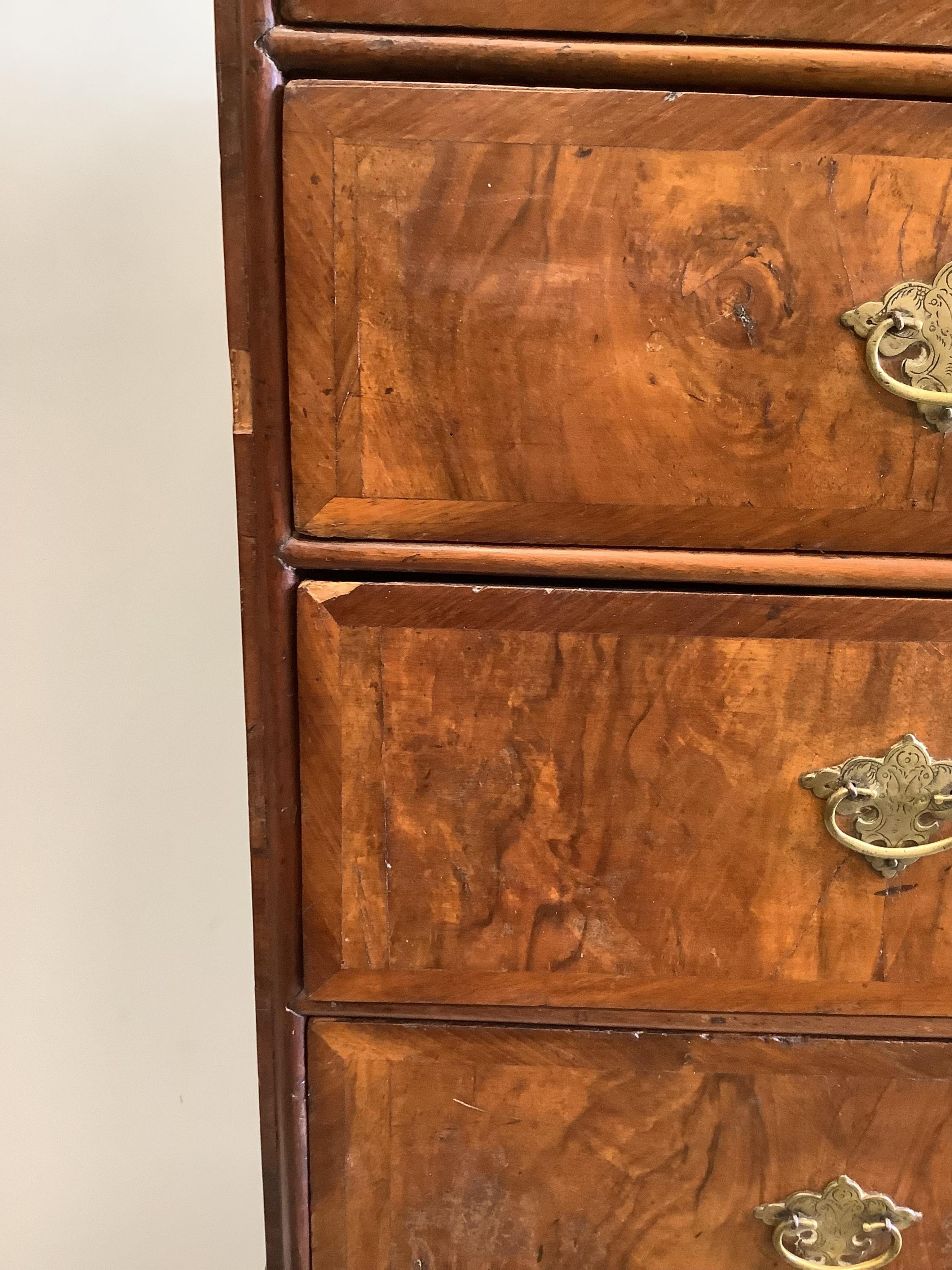 An 18th century and later walnut chest on stand, width 96cm, depth 55cm, height 161cm. Condition - fair